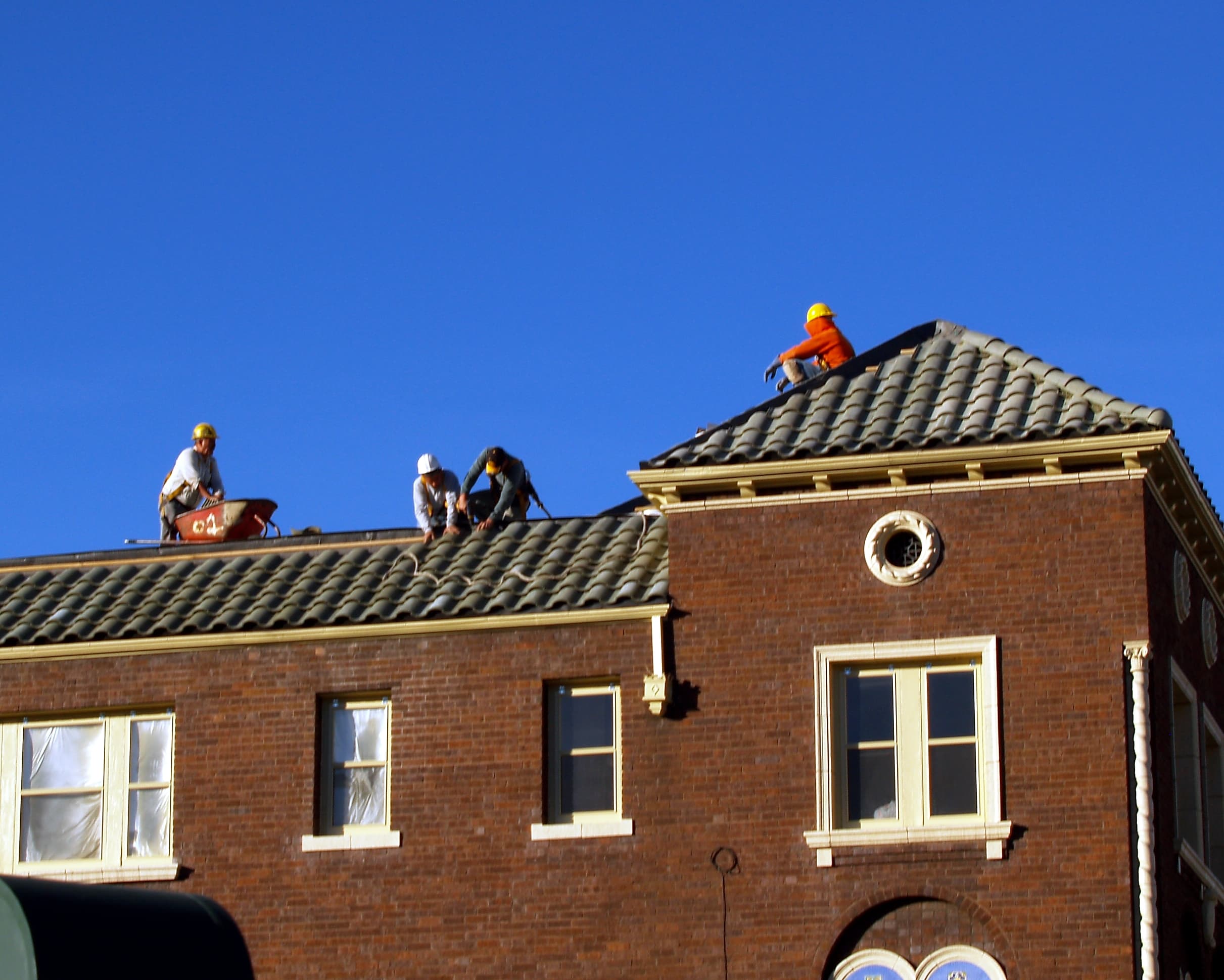 Roof Replacement in Austin, TX - Professional roofers installing a new roof